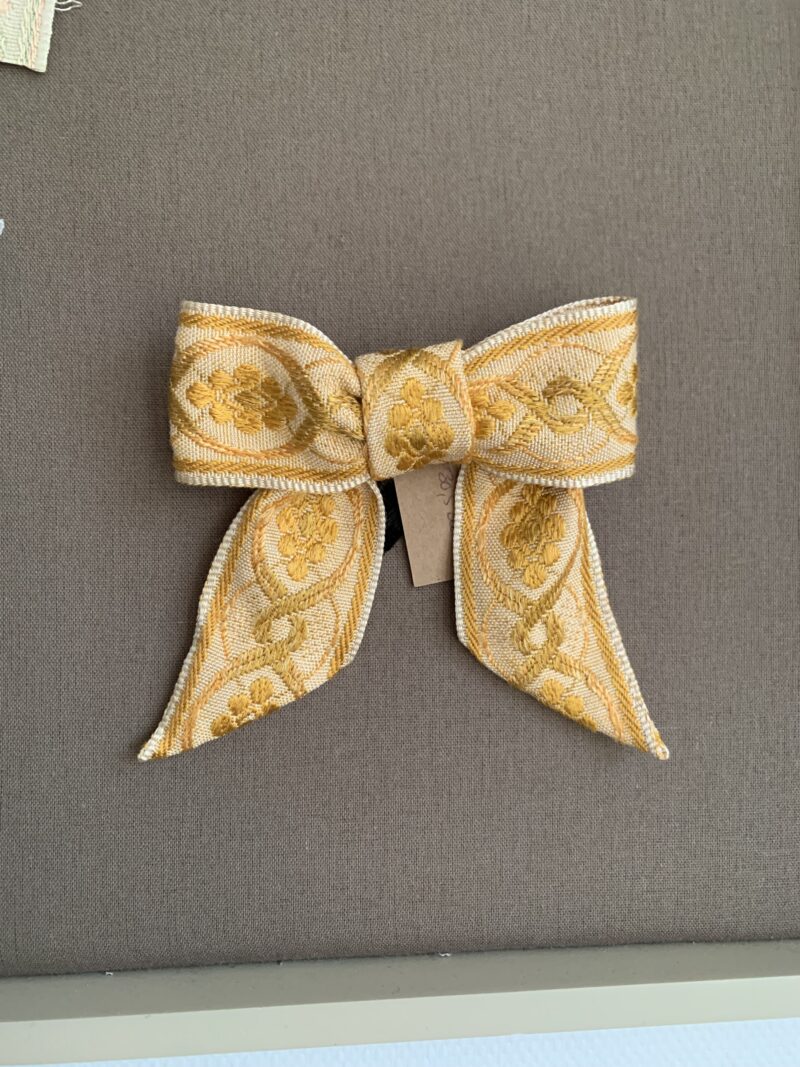 Barrette nœud jaune d'or